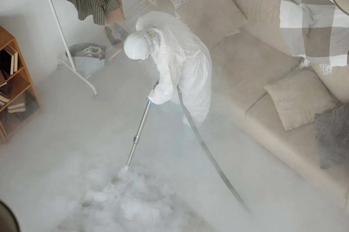 Biohazard cleanup technician in protective equipment, Frankfort, KY